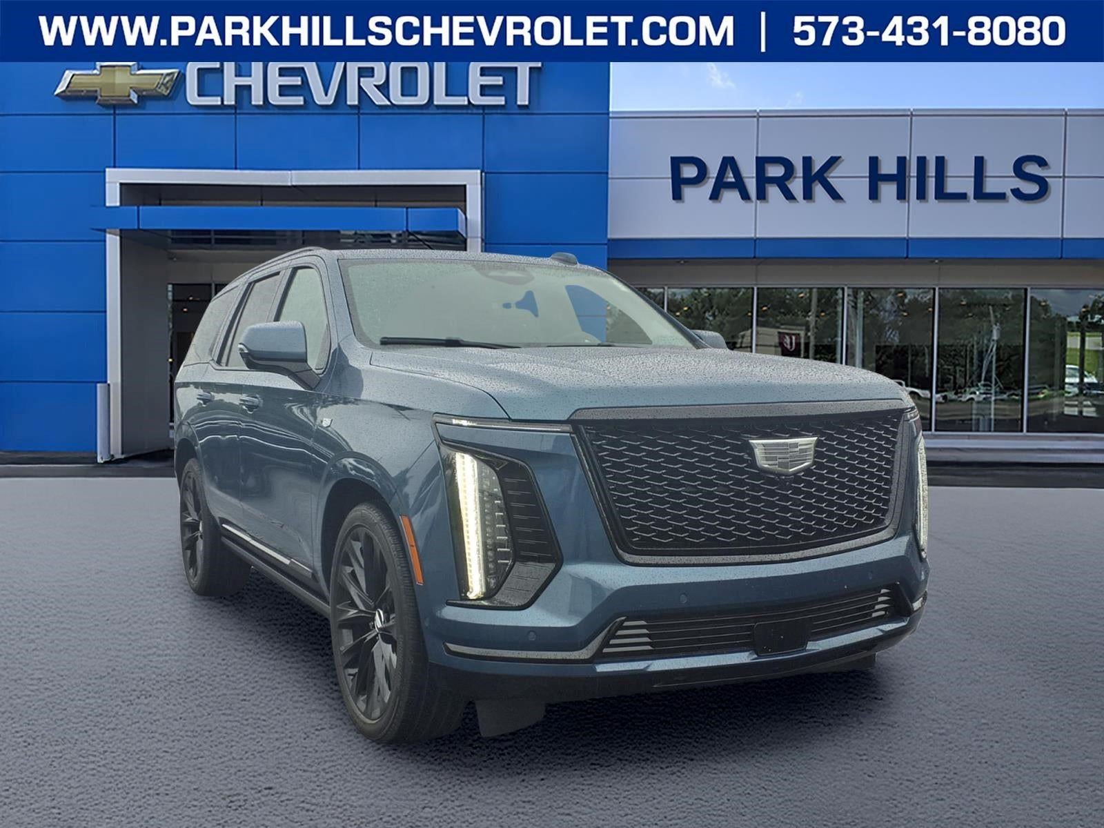 2025 Cadillac Escalade Sport Platinum in Deep Sea Metallic — front three-quarter view